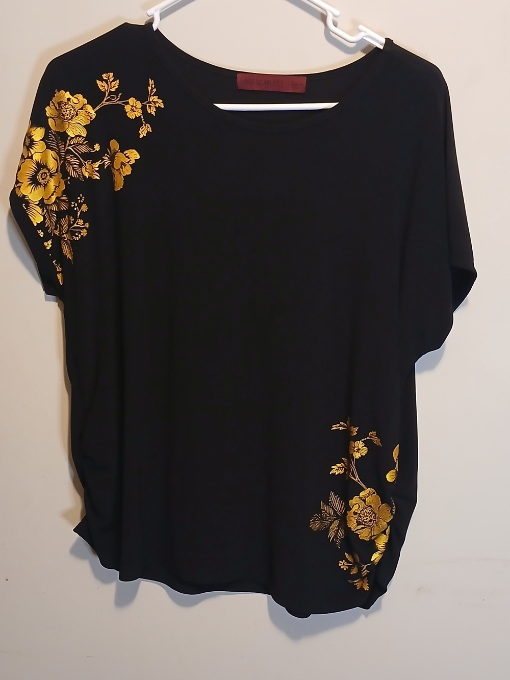 Black Short-Sleeve Women's Top with Gold Floral Detail
